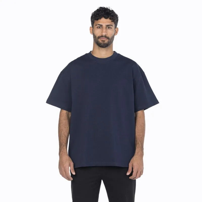 Male model wearing navy oversized crew from Intersect Collection