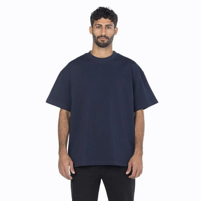 Male model wearing navy oversized crew from Intersect Collection