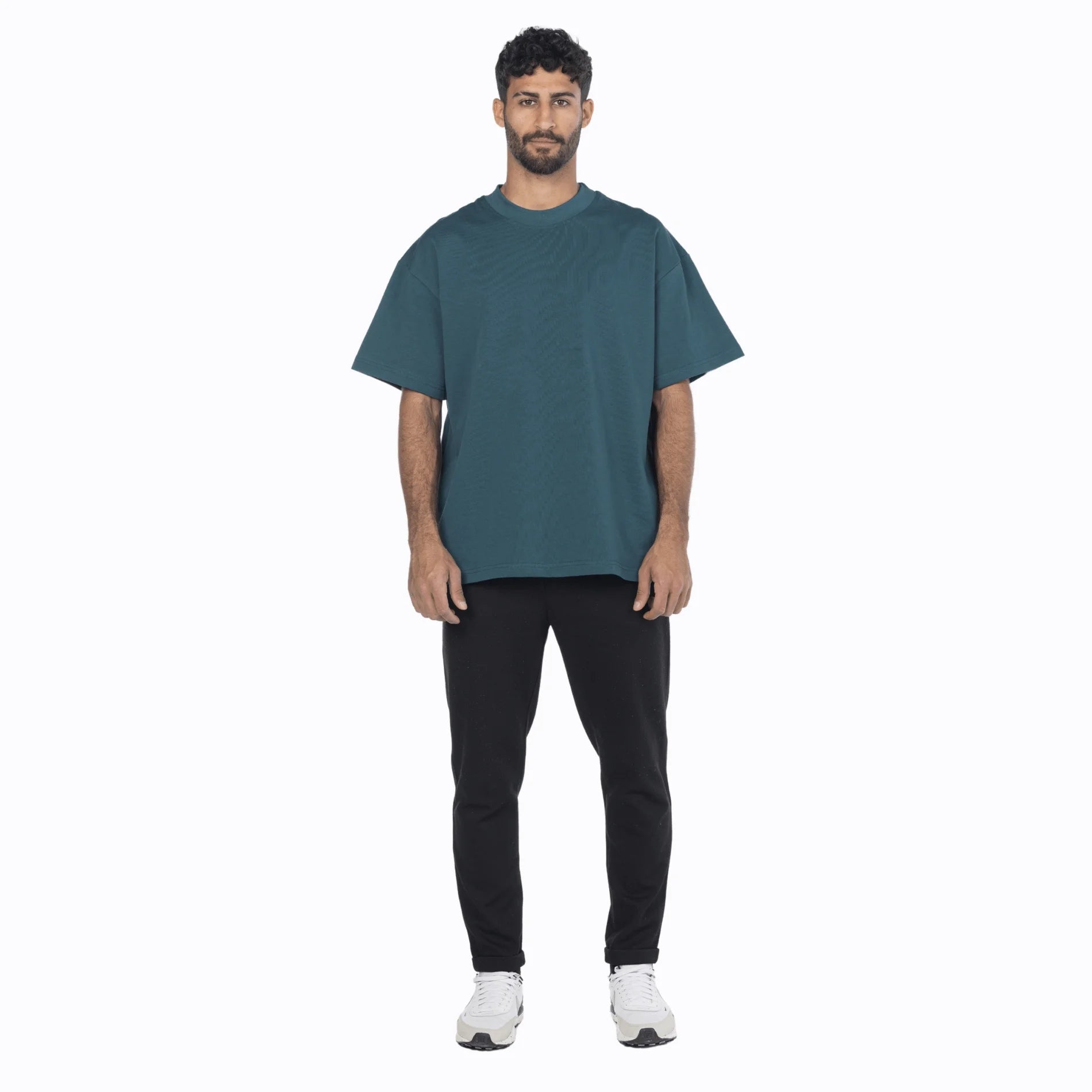Model wearing a vintage blue premium cotton oversized fit tee