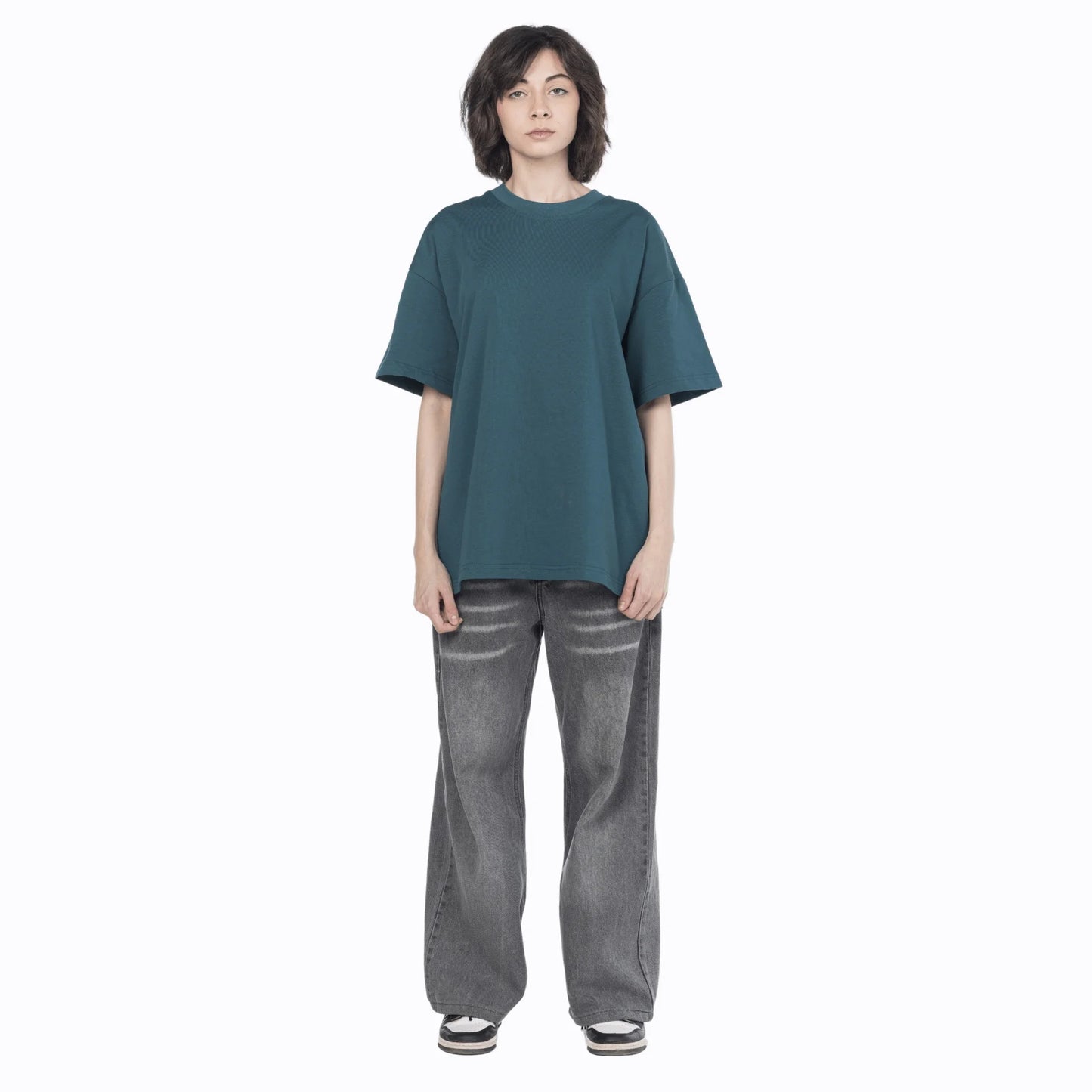 Female model wearing a vintage blue Giza cotton oversized jersey from Intersect collection