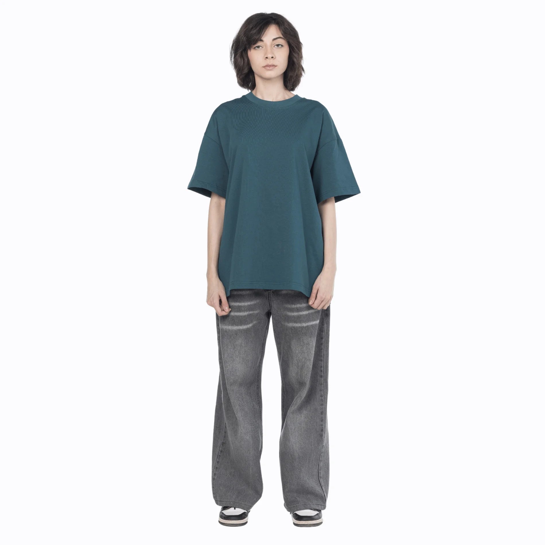 Female model wearing a vintage blue Giza cotton oversized jersey from Intersect collection