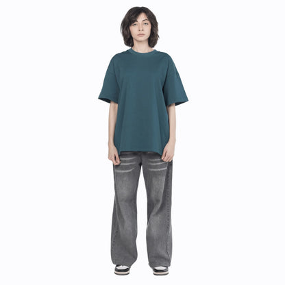 Female model wearing a vintage blue Giza cotton oversized jersey from Intersect collection