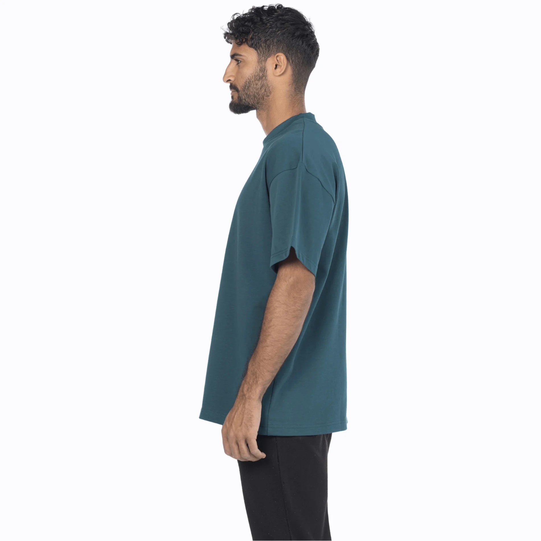 Male model wearing a vintage blue Egyptian cotton crew-neck drop shoulder tee