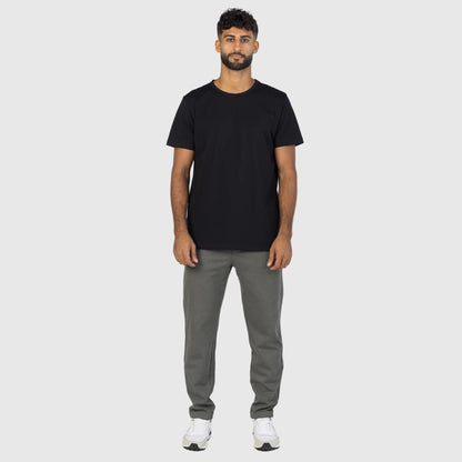 Model wearing a black Egyptian cotton tee with a tailored fit by Intersect Collection