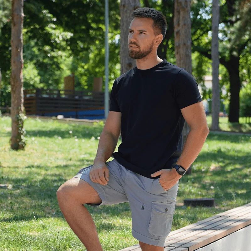 Model wearing a black Giza Egyptian cotton t-shirt with a tailored fit by Intersect Collection