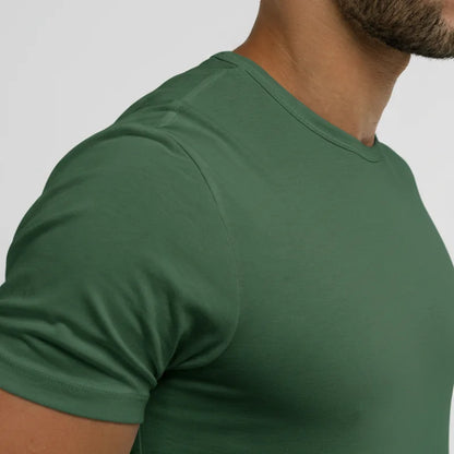 Close-up of soft meadow green Giza Egyptian cotton fabric used in Intersect Collection minimalist blank tee green